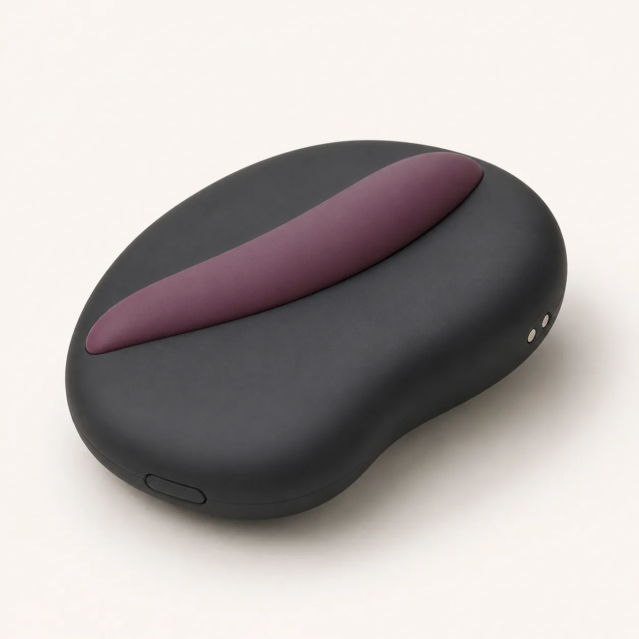 Palm-Squeeze Pebble Vibrator with Offset Contact Ridge
